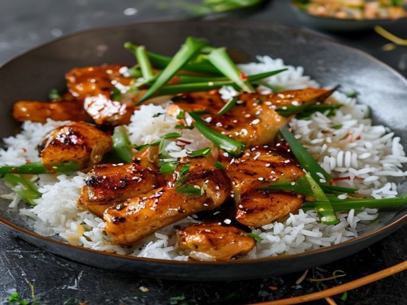 Finished 20-Minute Skillet Miso-Ginger Chicken with Coconut Rice & Crisp Snap Peas beautifully plated, professional food photography, natural lighting